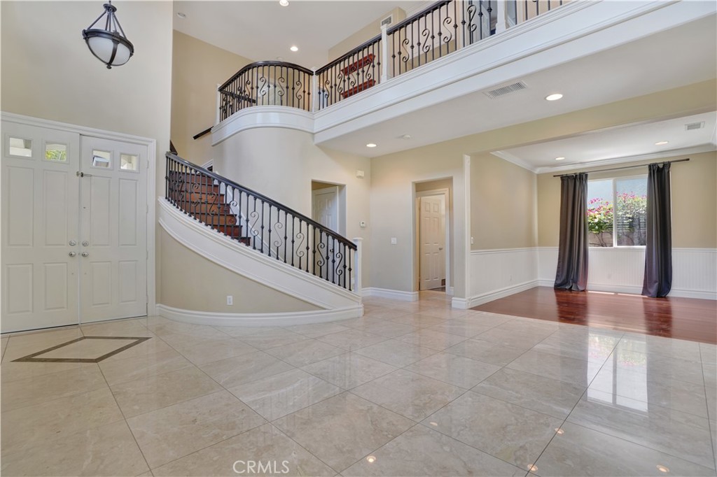 27585 Rosebud Way Laguna Niguel, CA 92677 - Photo 6 of 35 a view of entryway and hall with a front door
