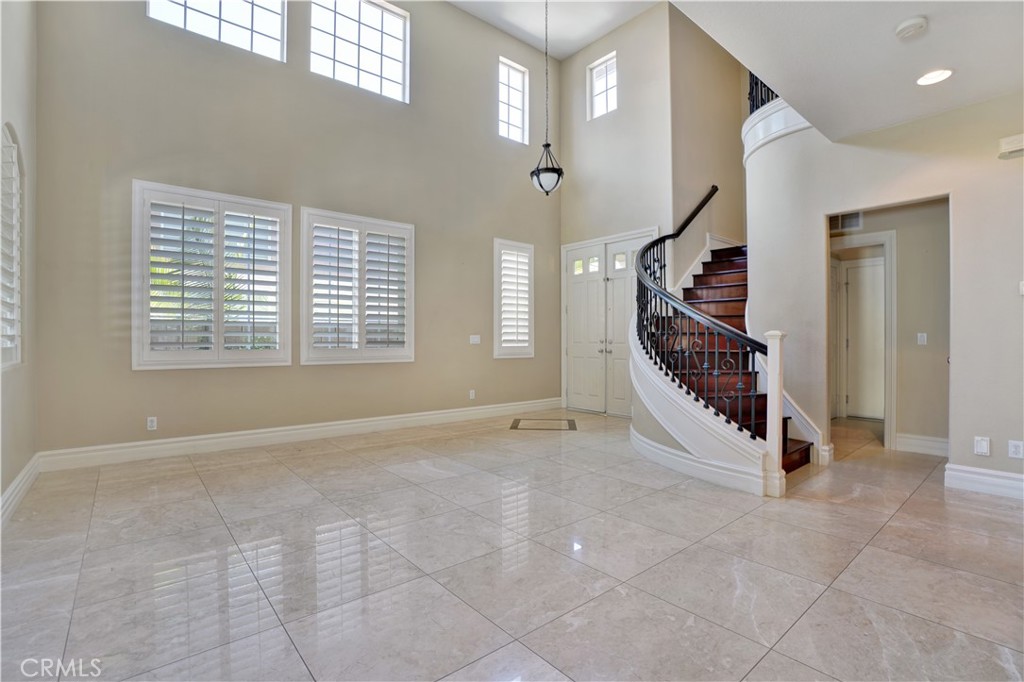 27585 Rosebud Way Laguna Niguel, CA 92677 - Photo 7 of 35 a view of an empty room with stairs and ventilation