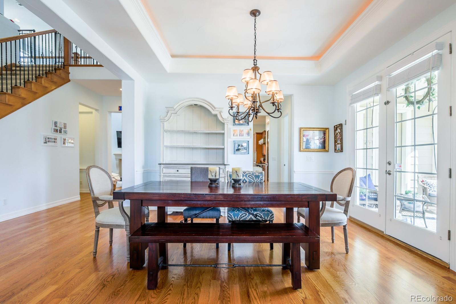 2322 Spruce Way Denver, CO 80238 - Photo 12 of 40 a view of a dining room with furniture window and wooden floor