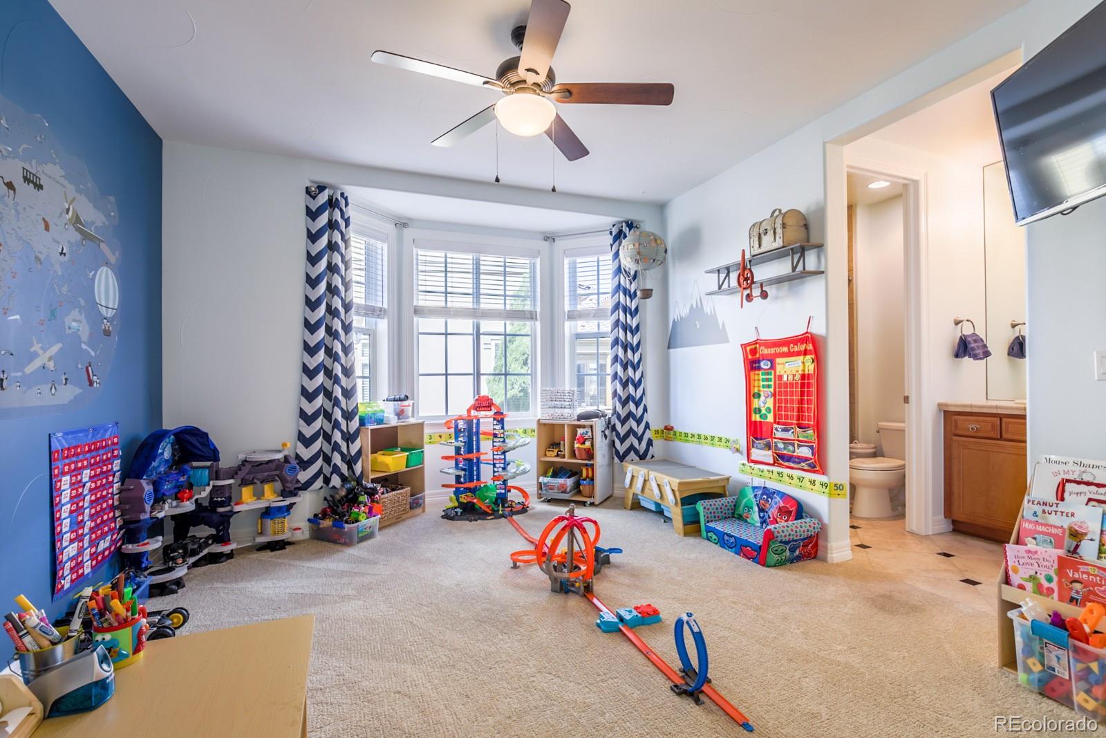 2322 Spruce Way Denver, CO 80238 - Photo 19 of 40 a children toys and a table in a room