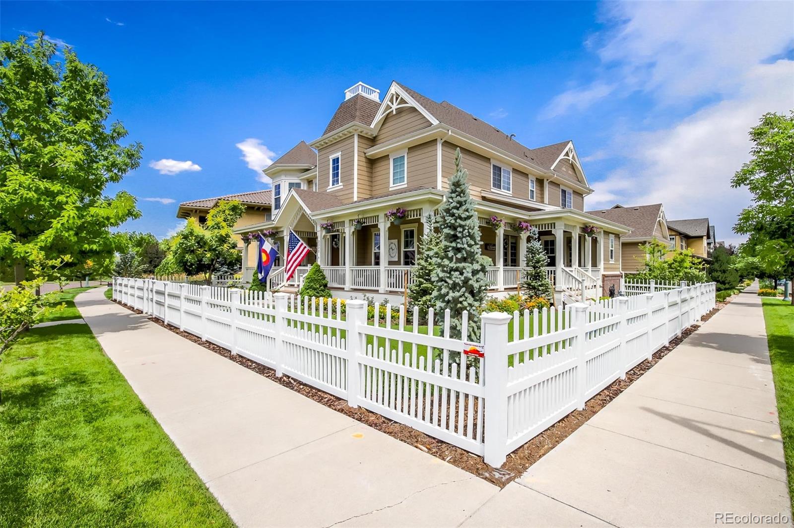 2322 Spruce Way Denver, CO 80238 - Photo 2 of 40 a front view of a house with a porch