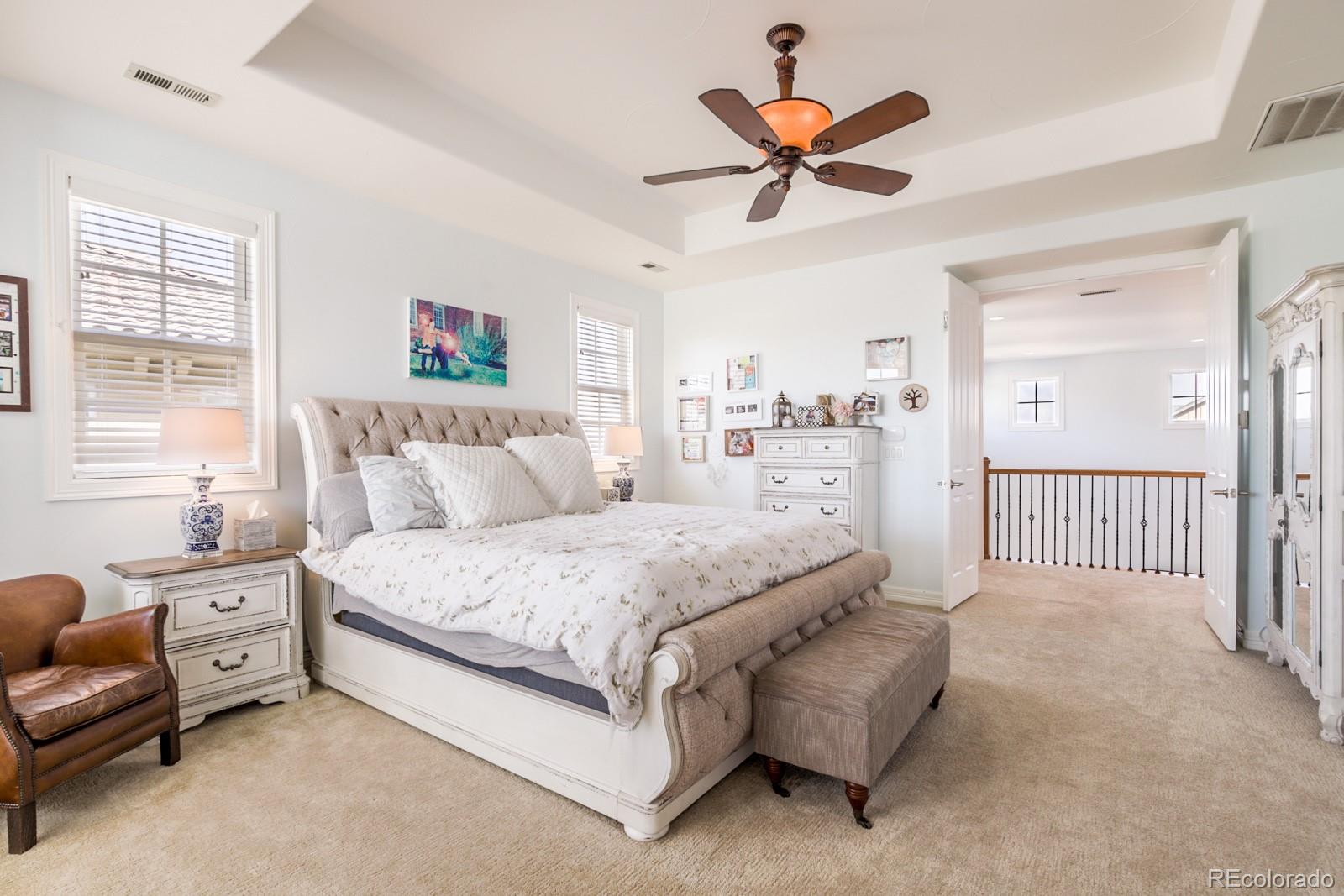 2322 Spruce Way Denver, CO 80238 - Photo 21 of 40 a spacious bedroom with a bed and a window