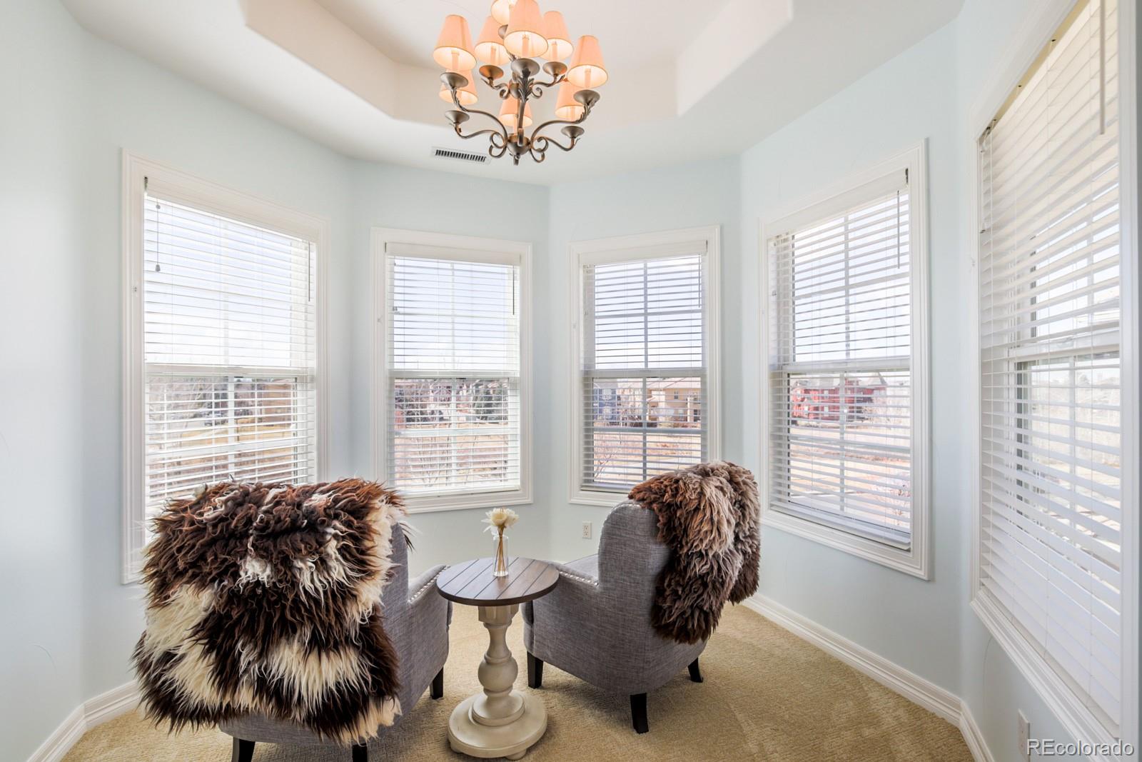 2322 Spruce Way Denver, CO 80238 - Photo 22 of 40 a living room with furniture and a large window