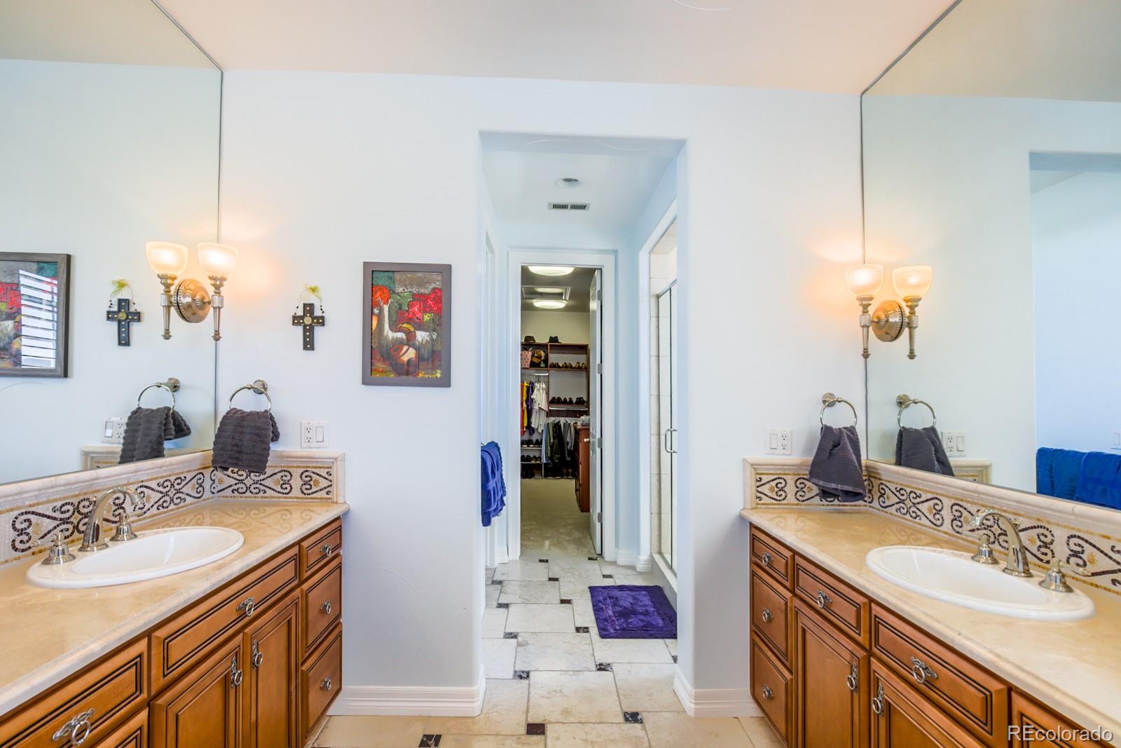2322 Spruce Way Denver, CO 80238 - Photo 24 of 40 a bathroom with a granite countertop double vanity sink and a mirror