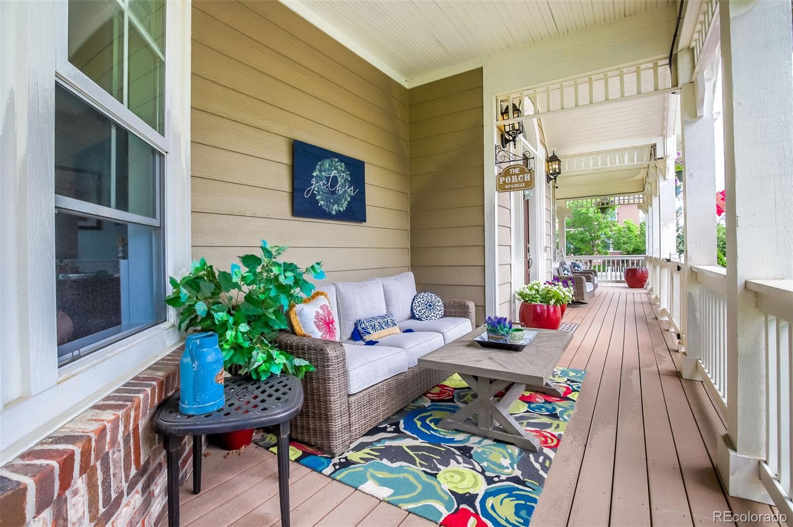 2322 Spruce Way Denver, CO 80238 - Photo 3 of 40 a reading room with furniture and a potted plant