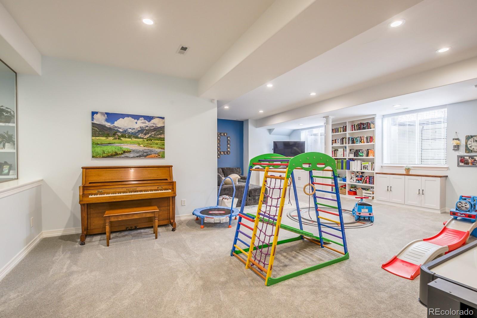 2322 Spruce Way Denver, CO 80238 - Photo 31 of 40 a bedroom with furniture and a gym equipment