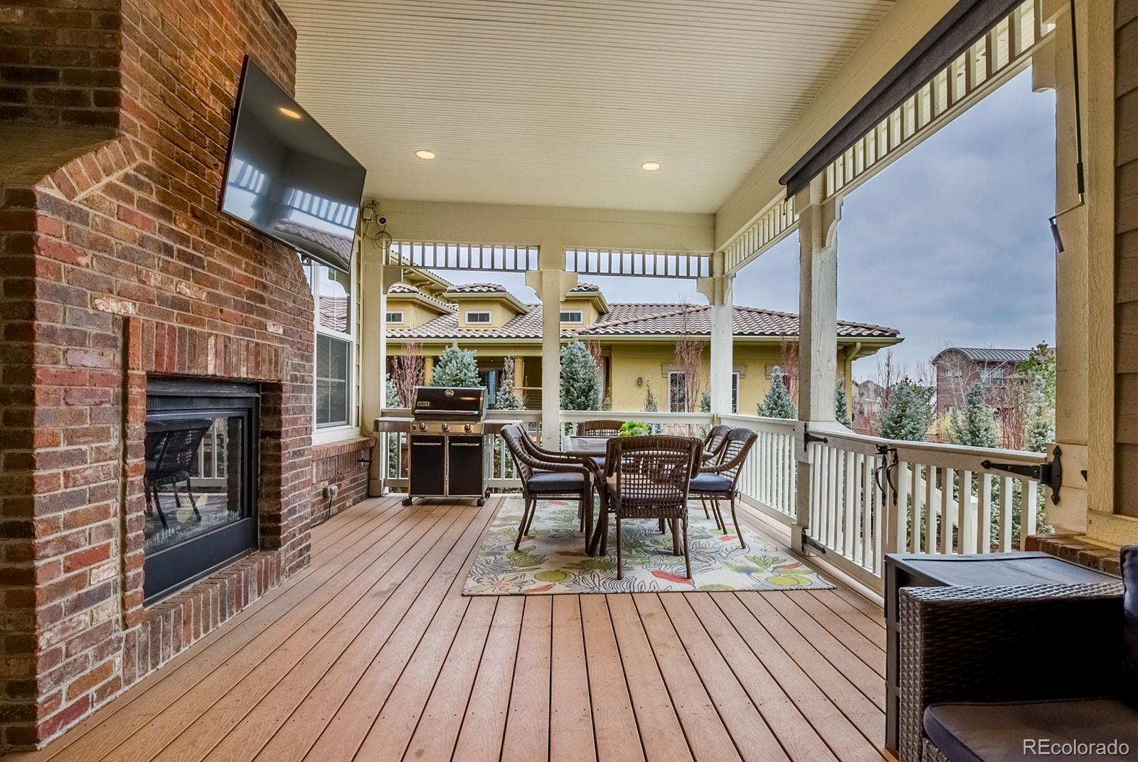 2322 Spruce Way Denver, CO 80238 - Photo 38 of 40 a view of a building with a table and chairs