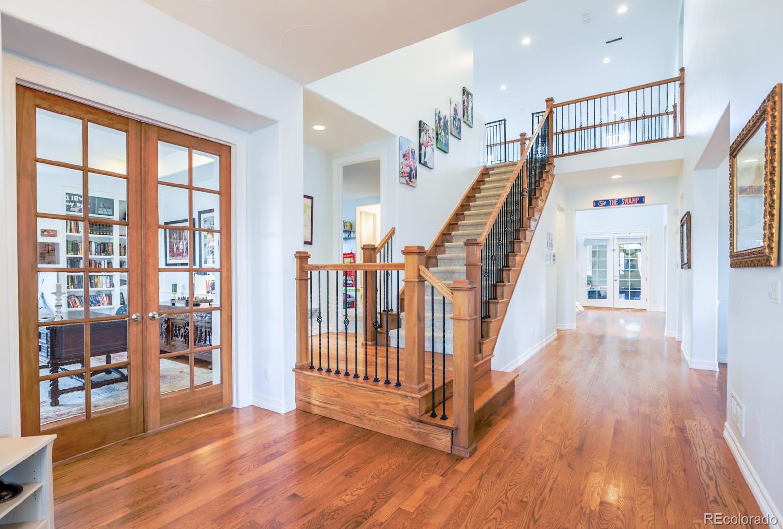 2322 Spruce Way Denver, CO 80238 - Photo 7 of 40 a view of entryway with wooden floor and windows