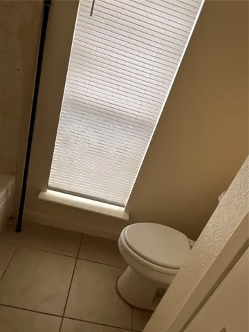 a bathroom with a toilet