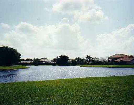 4413 Woodfield Boulevard Boca Raton, FL 33434 - Photo 1 of 2 a view of a garden with plants