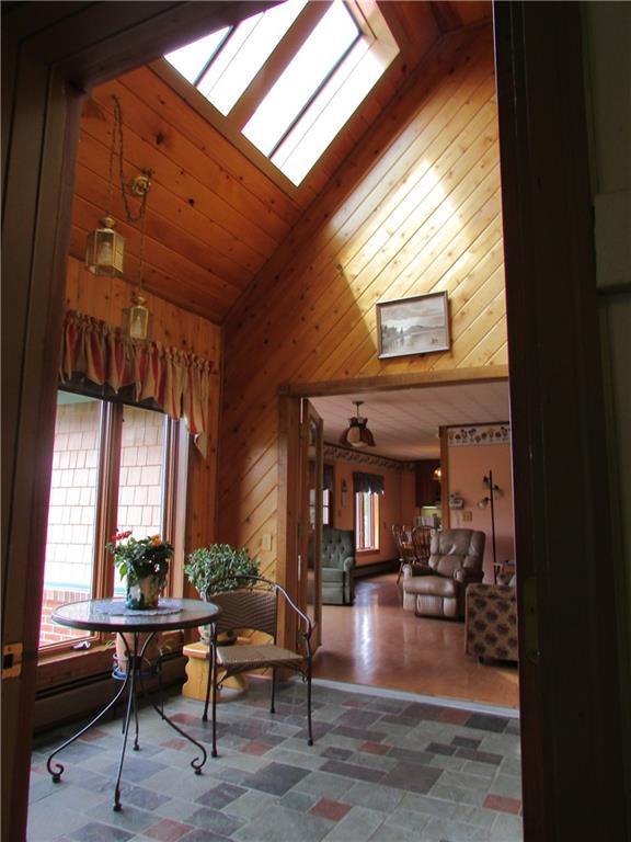 634 Sandy River Road Starks, ME 04911 - Photo 2 of 35 Direct entry from the garage. Wall...