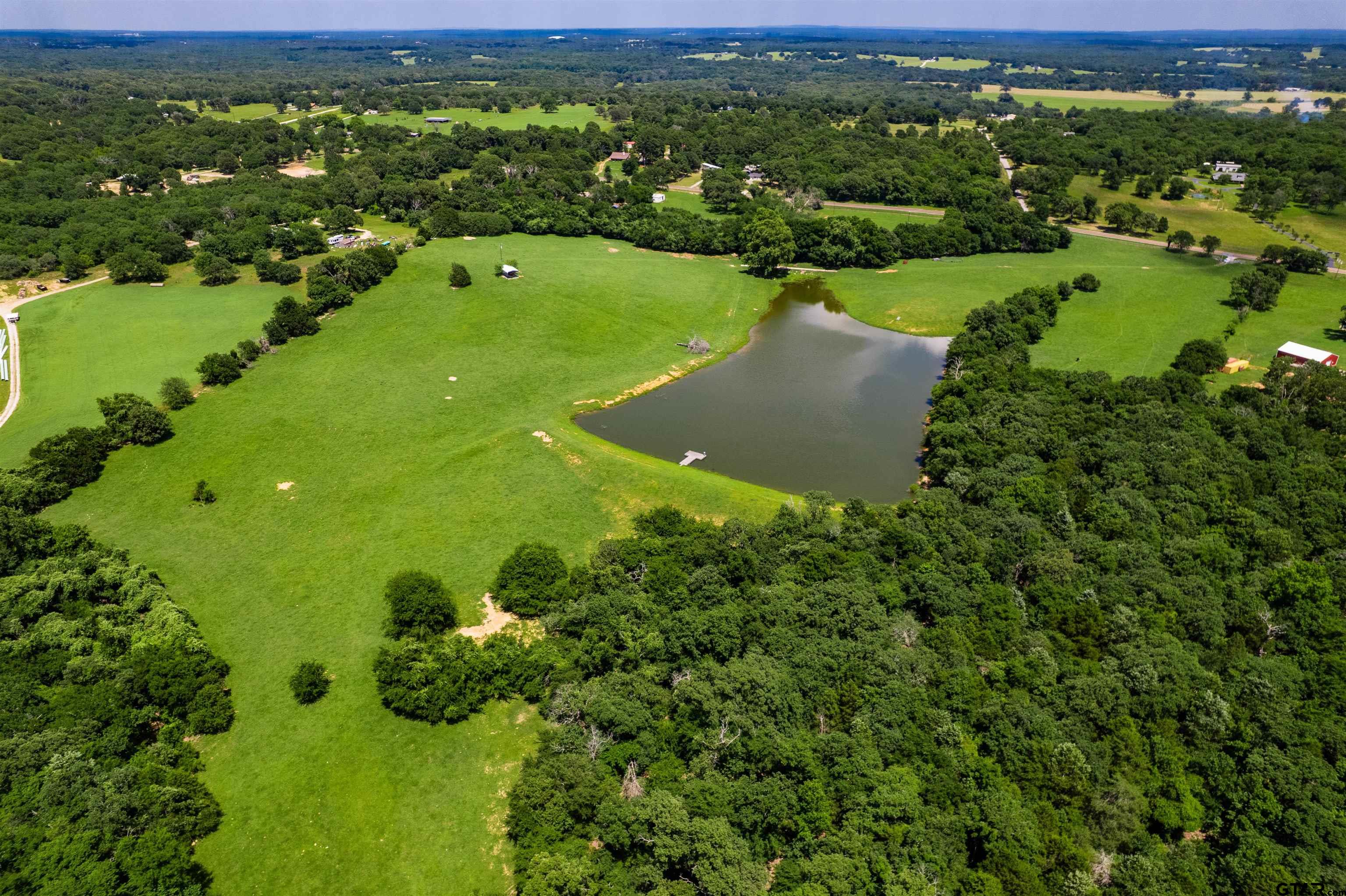 8970 Fm 59 Athens, TX 75751 - Photo 13 of 14 a view of a green yard with large trees
