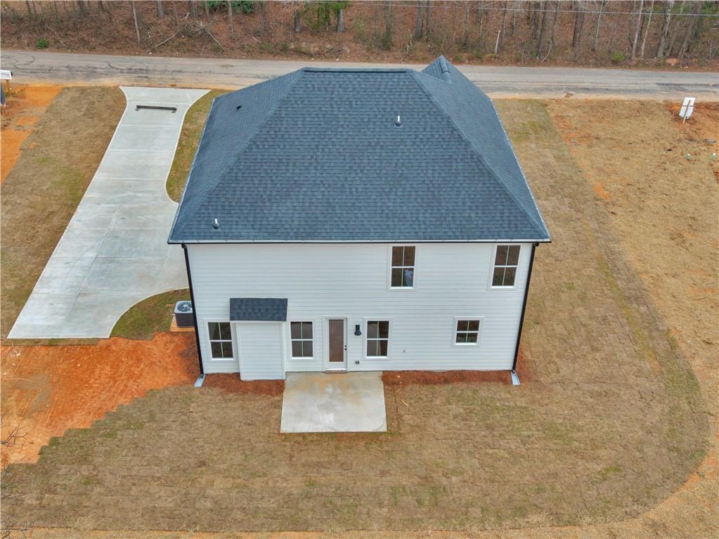 200 Loyd Road Mansfield, GA 30055 - Photo 54 of 54 a house with tall trees