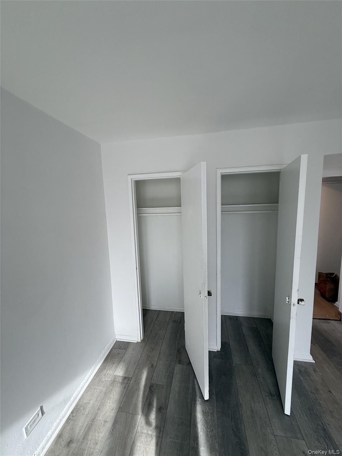 83-30 Vietor Avenue, Unit 727 Queens, NY 11373 - Photo 10 of 11 an empty room with wooden floor