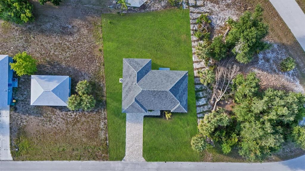 199 Statler Street Port Charlotte, FL 33954 - Photo 17 of 33 a view of a house with a yard