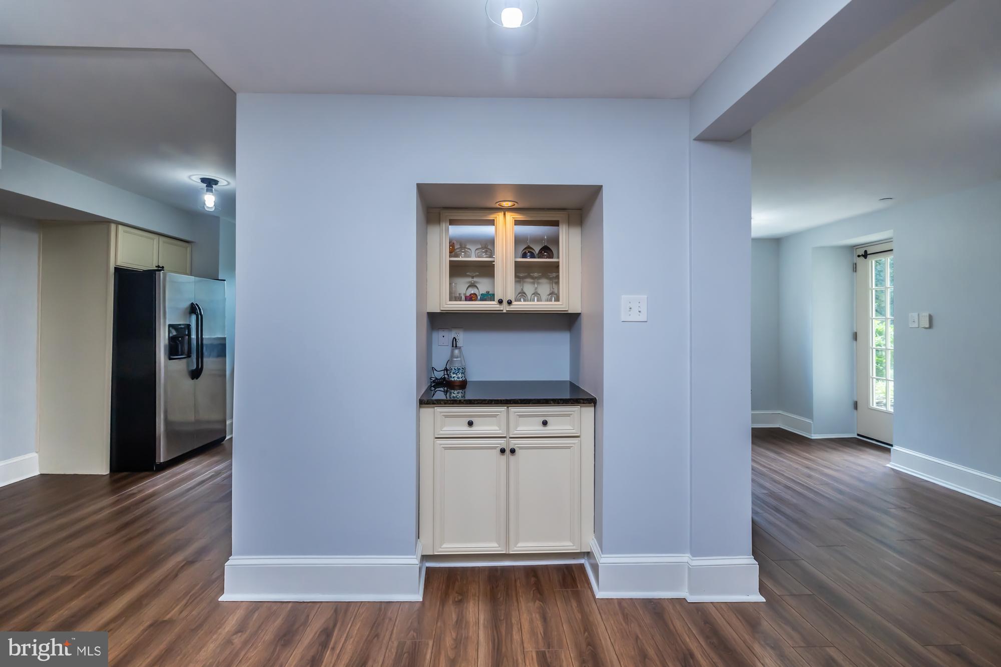 212 Idris Road, Unit Z1 Merion Station, PA 19066 - Photo 15 of 35 a view of kitchen with wooden floor electronic appliances and window