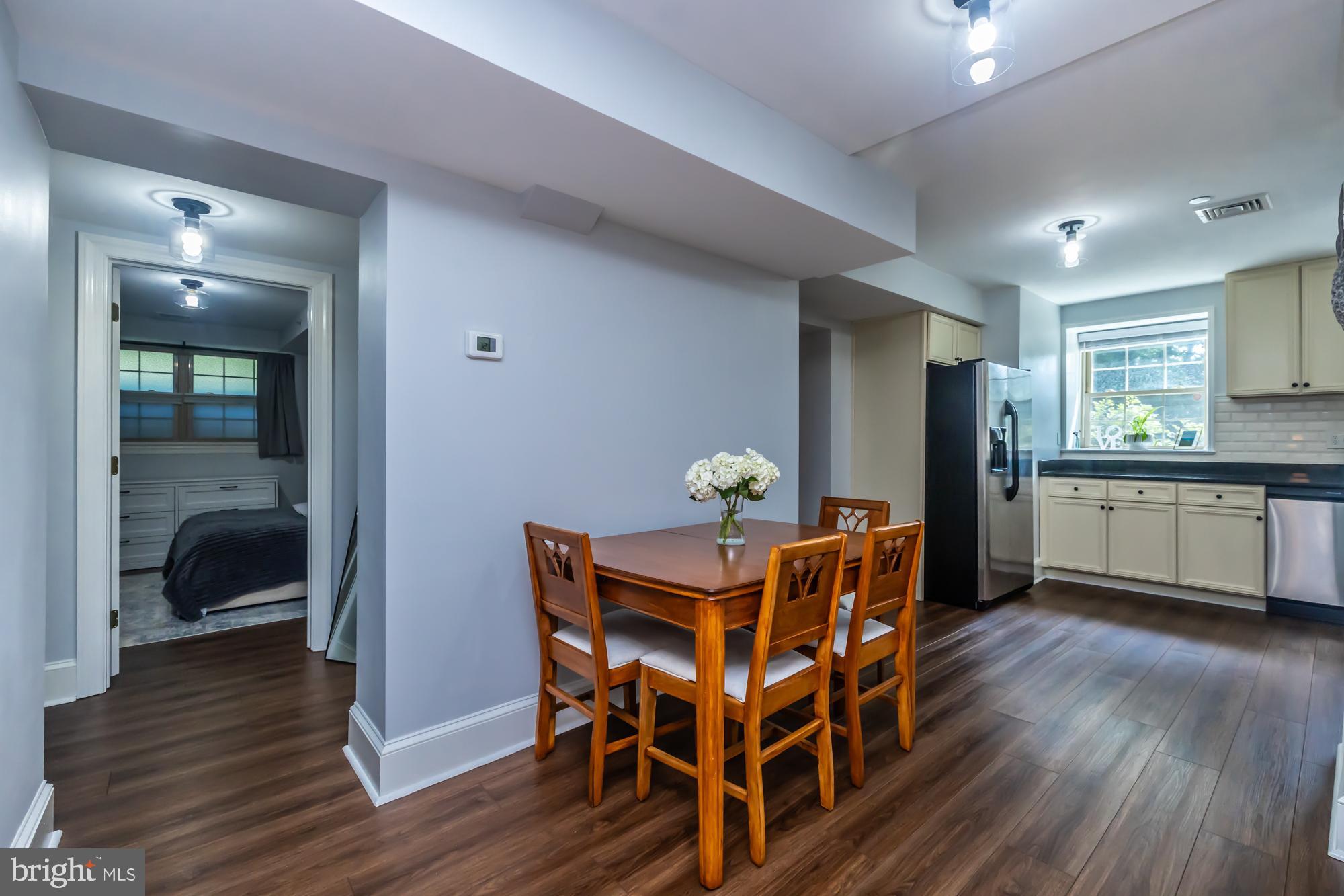 212 Idris Road, Unit Z1 Merion Station, PA 19066 - Photo 17 of 35 a view of a dining room with furniture and wooden floor
