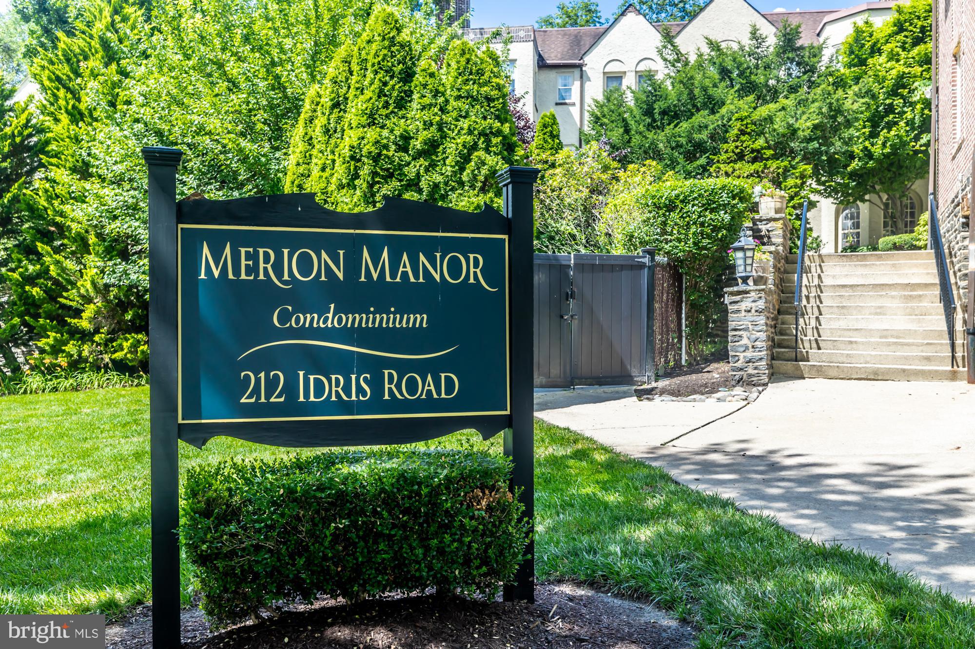 212 Idris Road, Unit Z1 Merion Station, PA 19066 - Photo 2 of 35 a sign on the side of a building