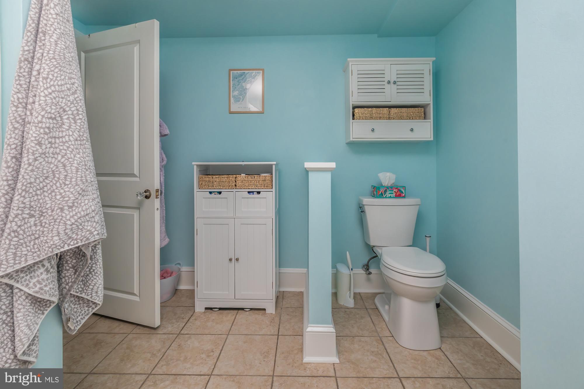 212 Idris Road, Unit Z1 Merion Station, PA 19066 - Photo 26 of 35 a white toilet sitting next to a bathroom sink