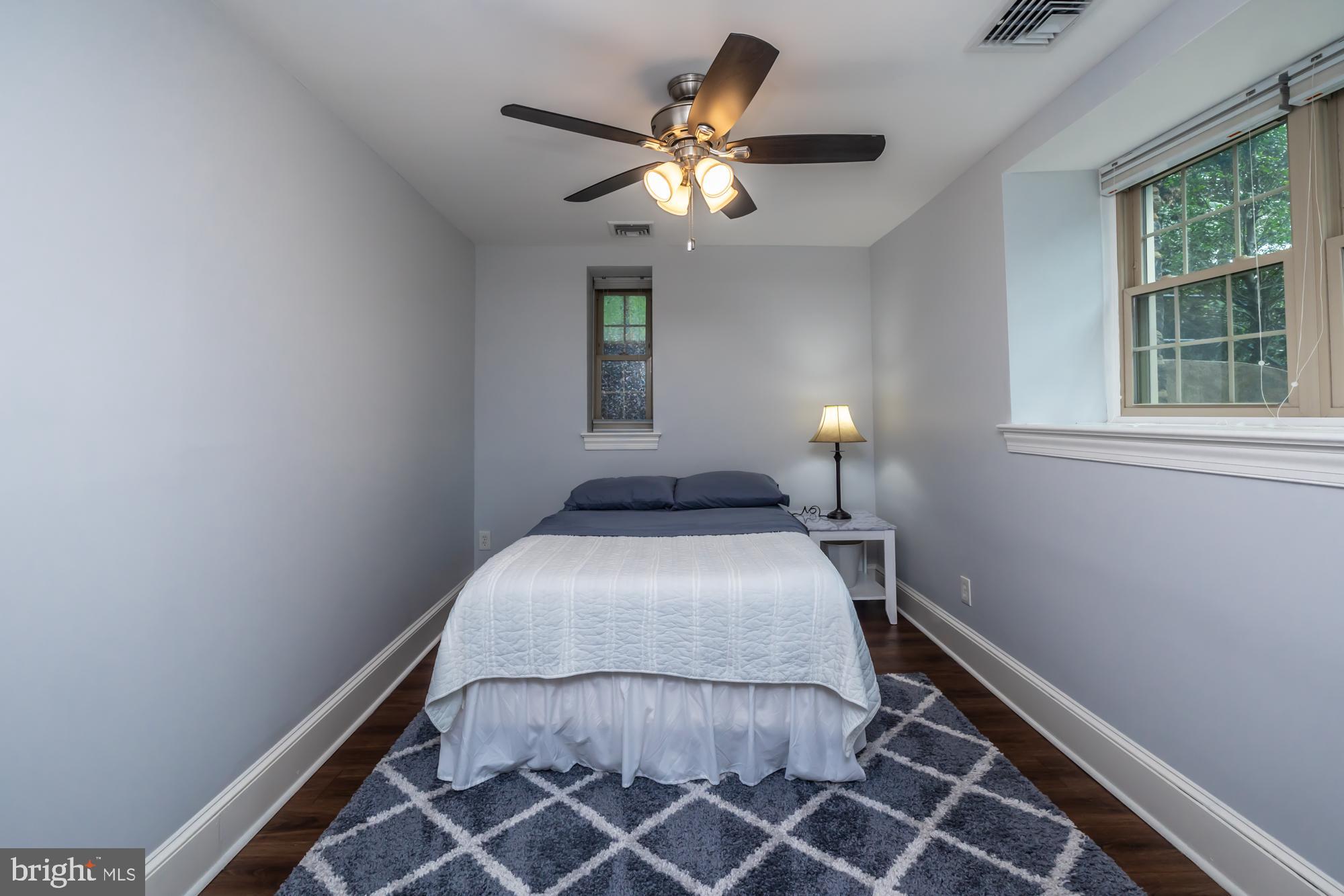 212 Idris Road, Unit Z1 Merion Station, PA 19066 - Photo 31 of 35 a bedroom with a bed and window