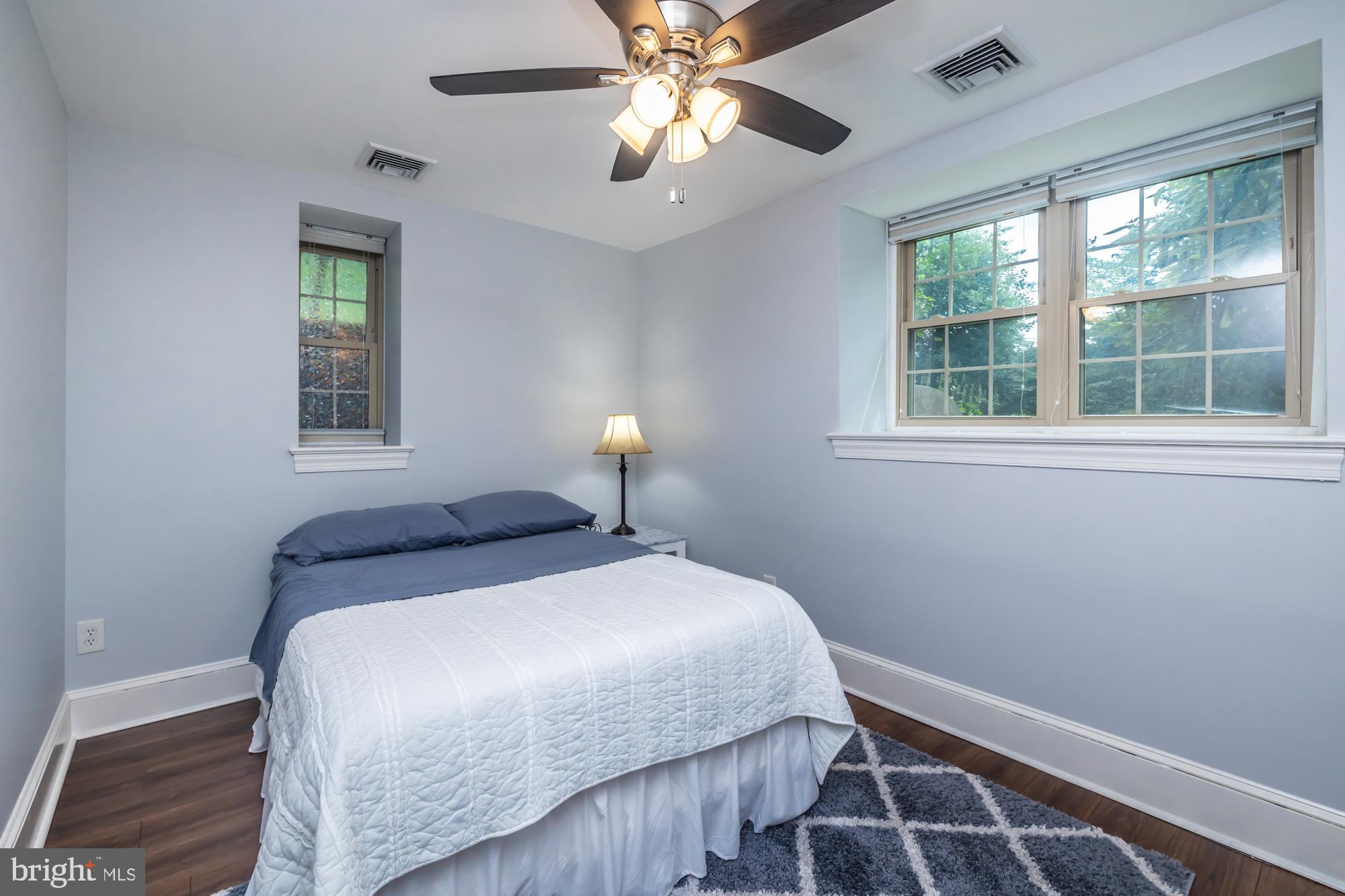 212 Idris Road, Unit Z1 Merion Station, PA 19066 - Photo 32 of 35 a bedroom with a bed and a window