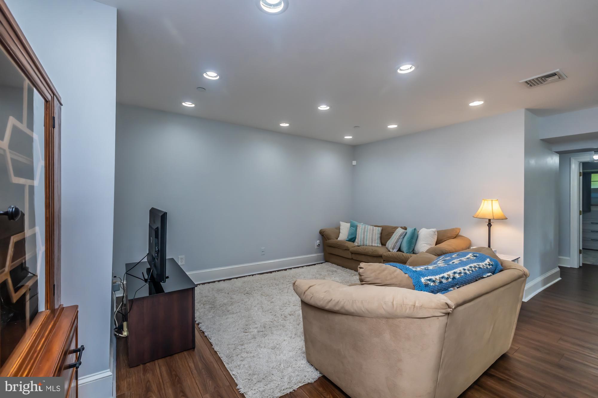 212 Idris Road, Unit Z1 Merion Station, PA 19066 - Photo 9 of 35 a living room with furniture and a couch