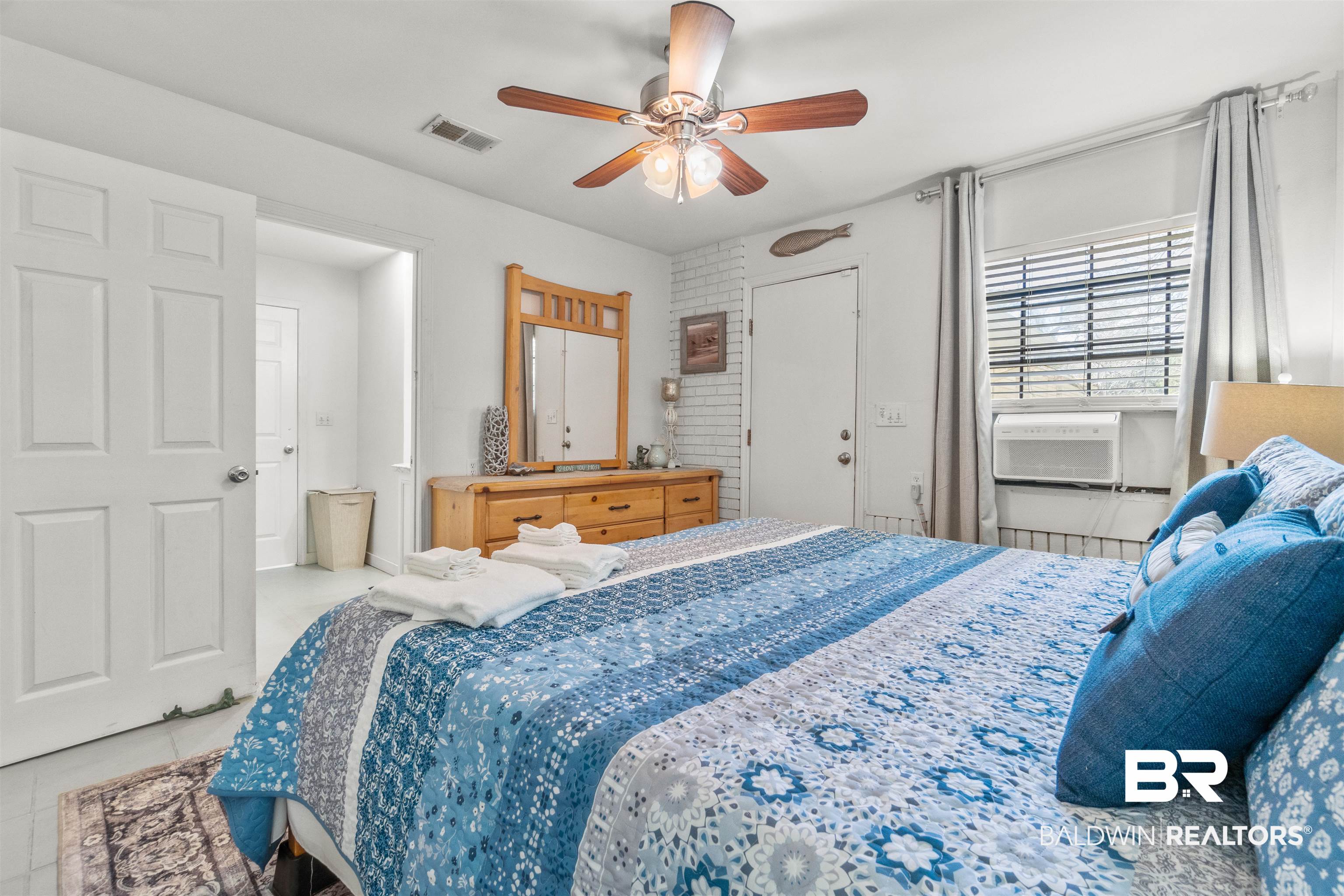 17595 River Road Summerdale, AL 36580 - Photo 10 of 29 Bedroom featuring a ceiling fan