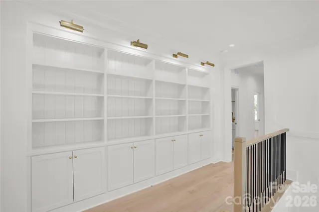 a swimming pool view with a outdoor seating space