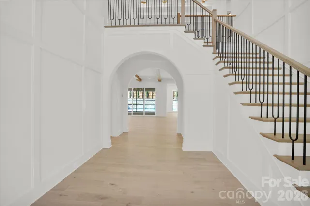 a bathroom with a sink a mirror and bathtub