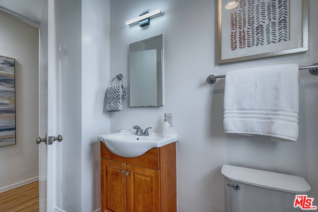 95 Kenneth Street Camarillo, CA 93010 - Photo 18 of 25 a bathroom with a sink toilet and mirror