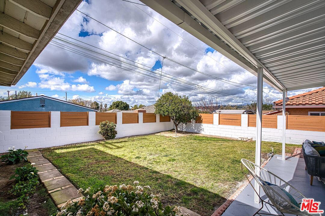 95 Kenneth Street Camarillo, CA 93010 - Photo 23 of 25 a front view of a house with garden