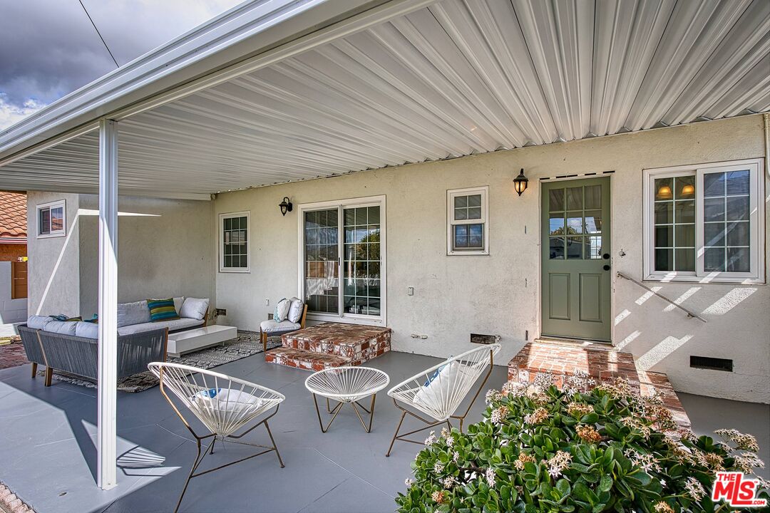 95 Kenneth Street Camarillo, CA 93010 - Photo 24 of 25 a backyard of a house with outdoor seating