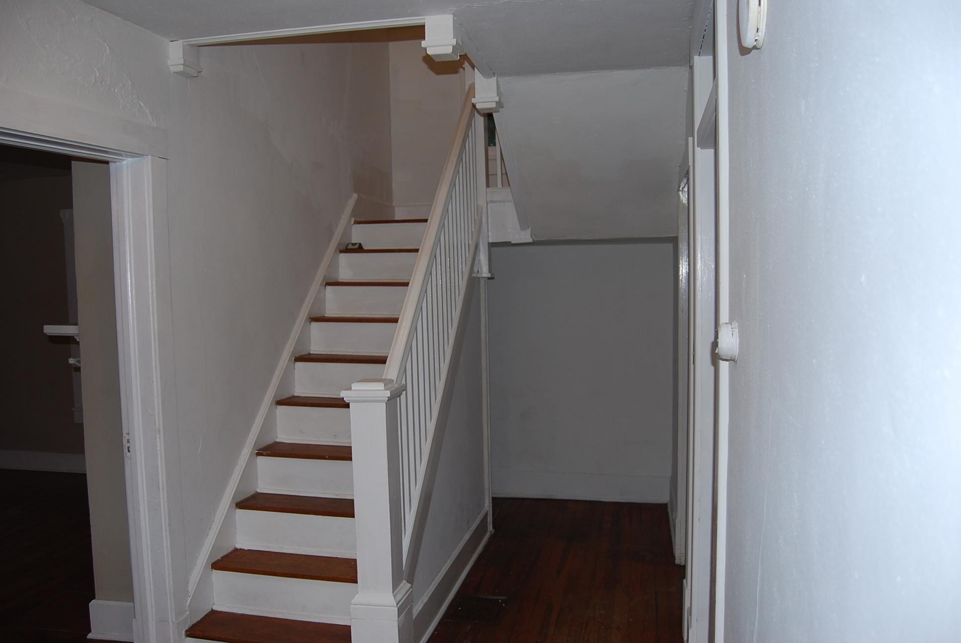 892 Virginia Avenue Goshen, VA 24439 - Photo 9 of 24 a view of entryway with stairs and wooden floor