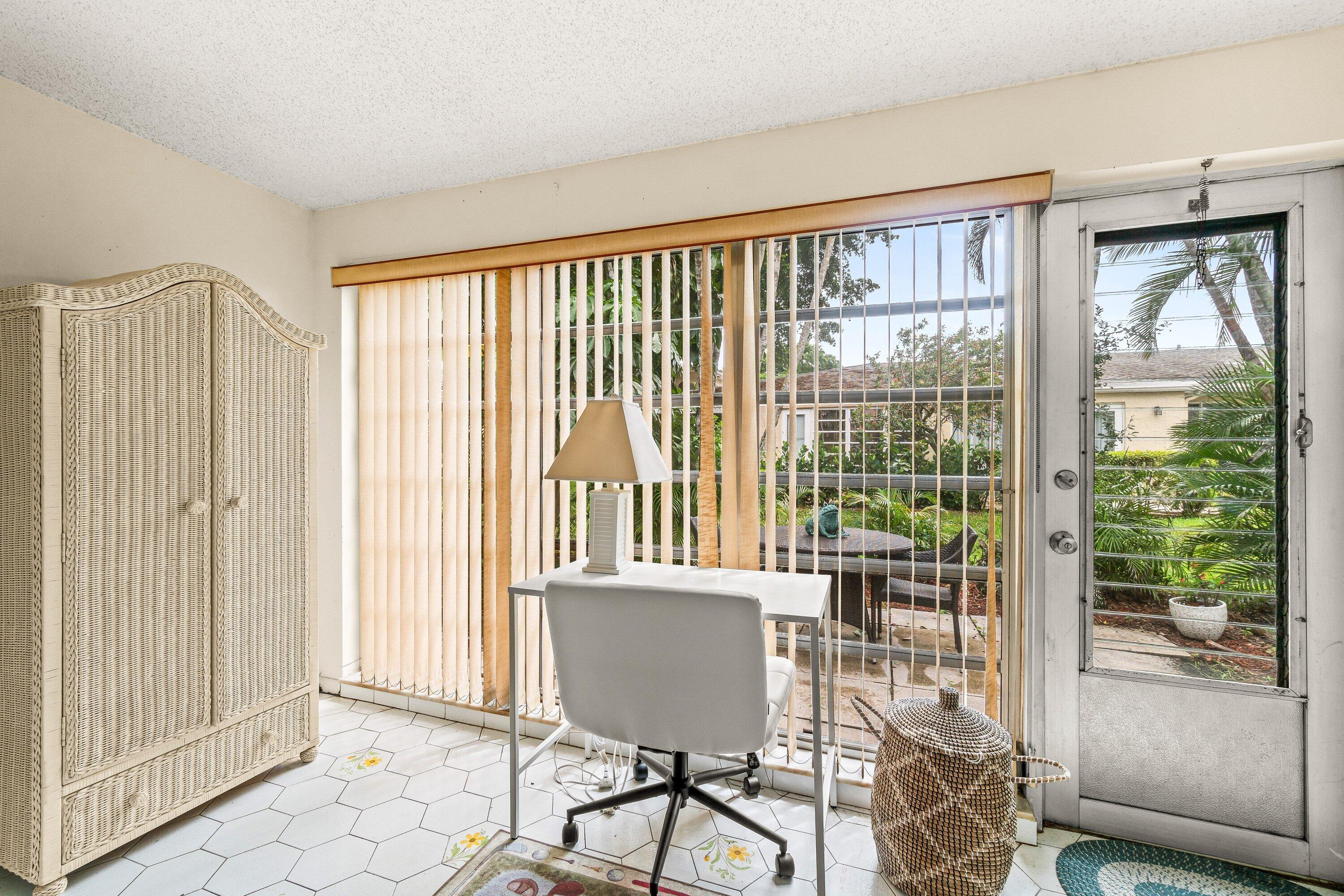 13735 Flora Place, Unit B Delray Beach, FL 33484 - Photo 11 of 28 a view of a room with a large window
