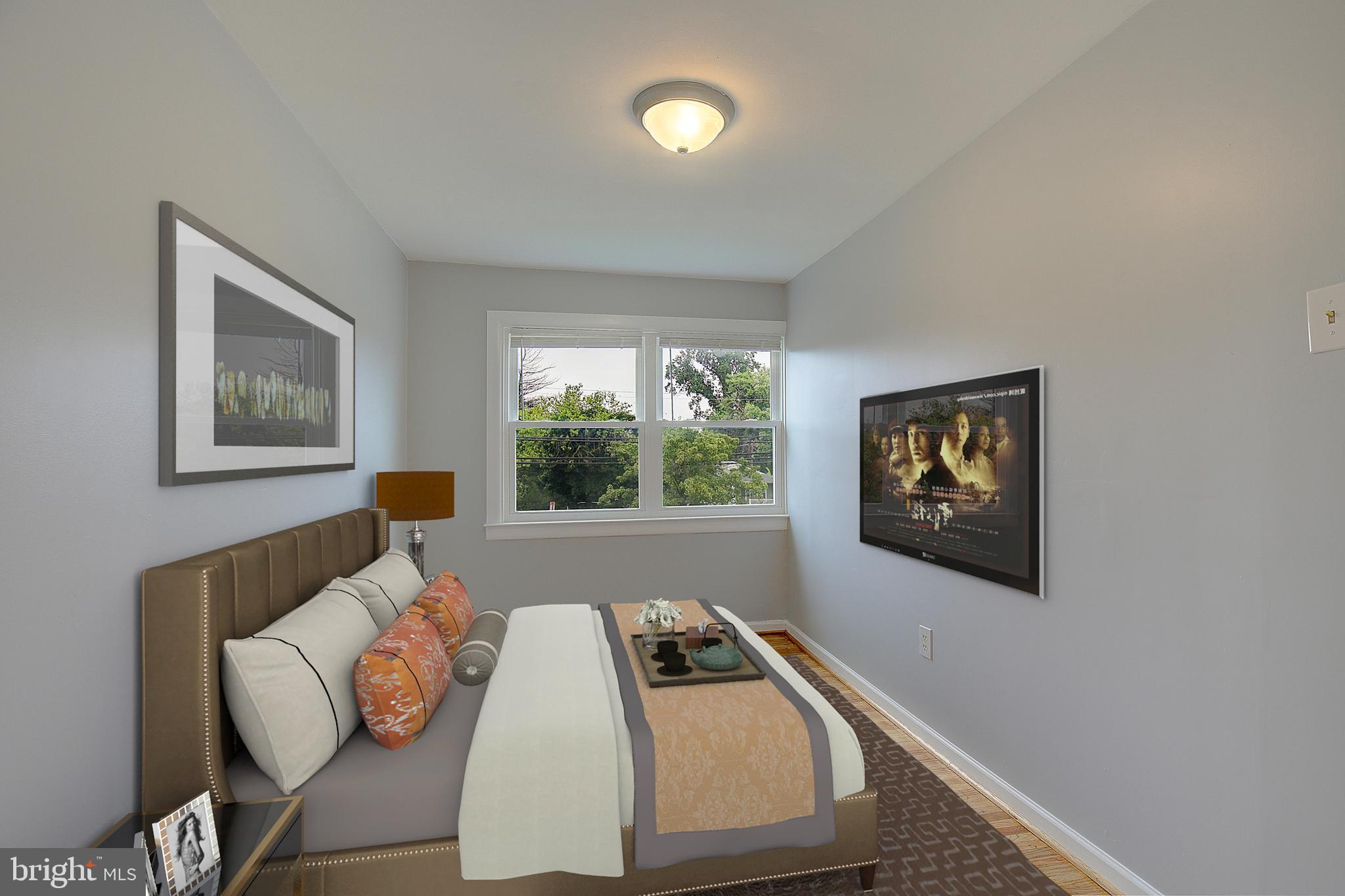 4330 Annapolis Road Baltimore, MD 21227 - Photo 20 of 34 a living room with furniture and a large window