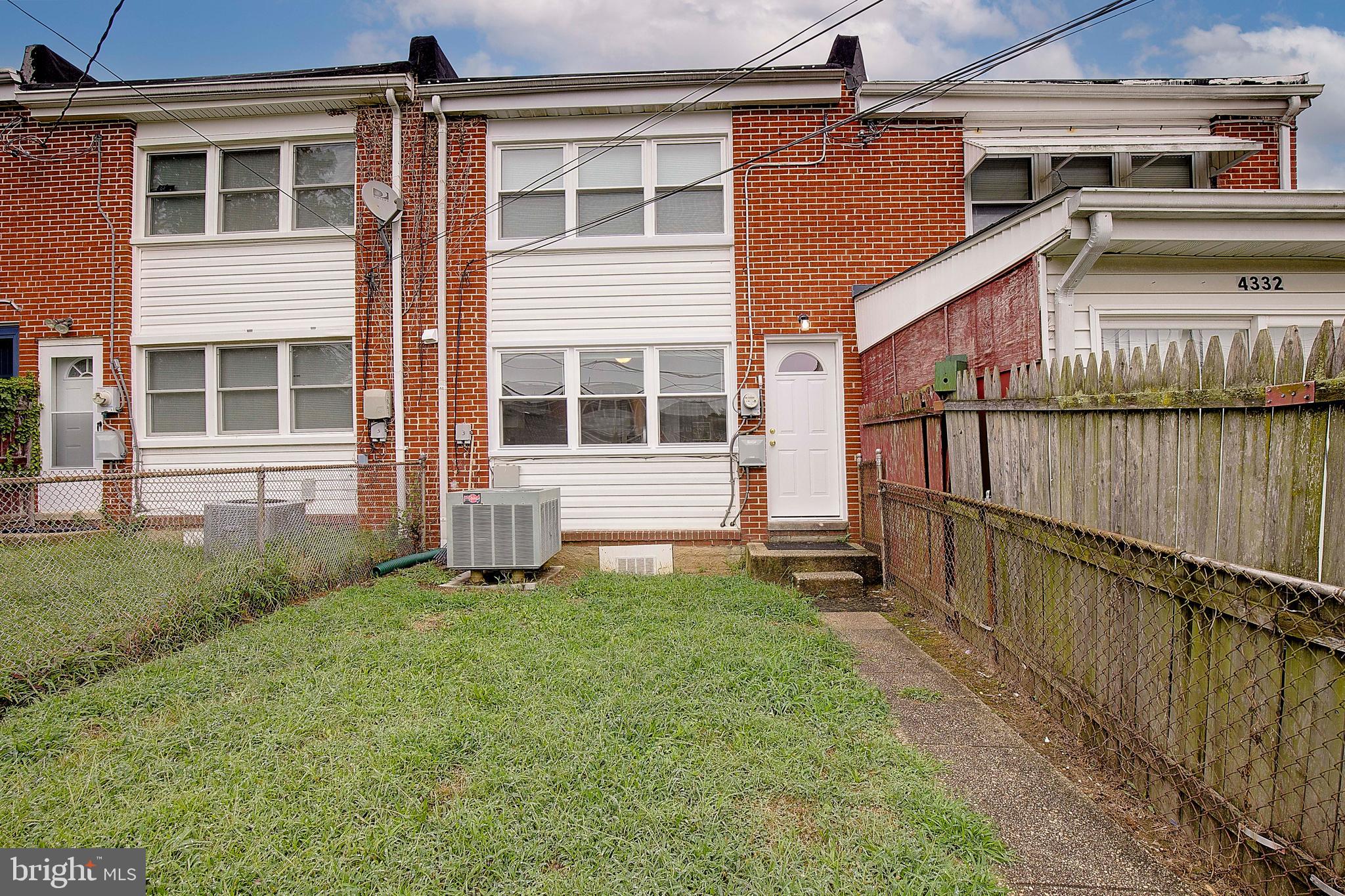4330 Annapolis Road Baltimore, MD 21227 - Photo 33 of 34 a view of a house with backyard and sitting area