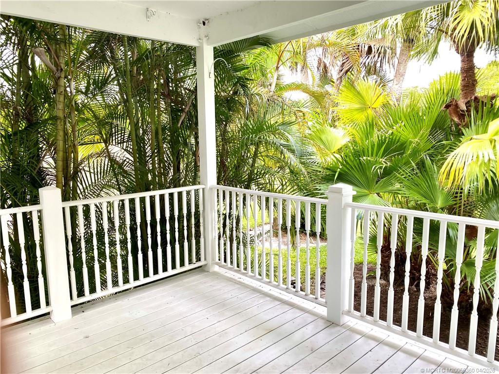 625 Southwest Salerno Road Stuart, FL 34997 - Photo 5 of 21 a view of a balcony with wooden floor