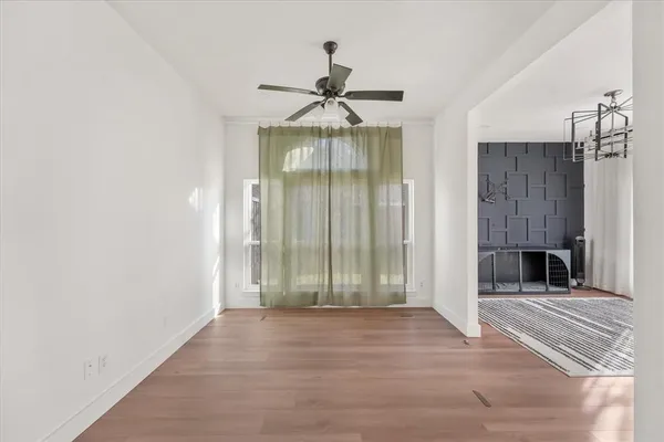 a view of entryway with wooden floor