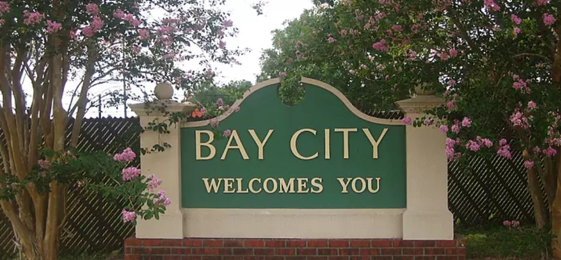 a sign broad on wooden wall