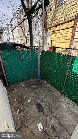 a view of a back yard of the house