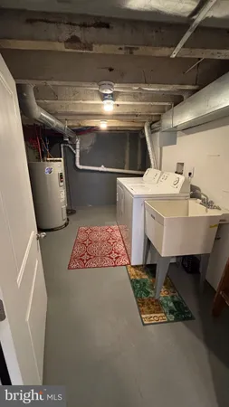a water heater sitting in a kitchen