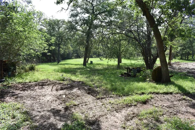 a view of road with trees