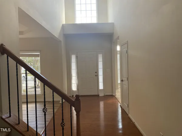 a view of entryway with wooden floor