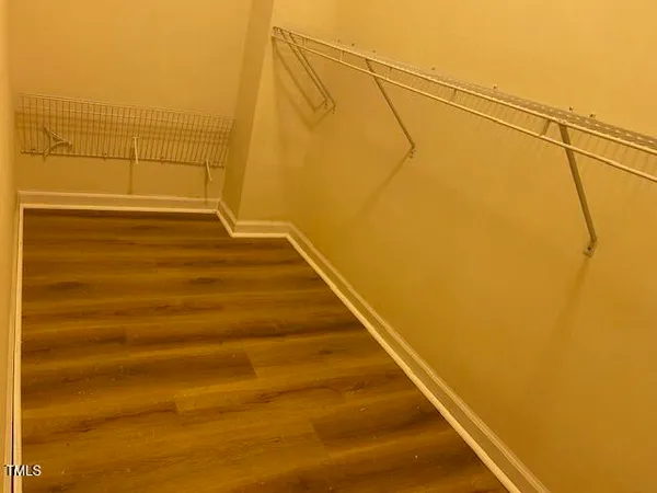 a view of a balcony with empty racks