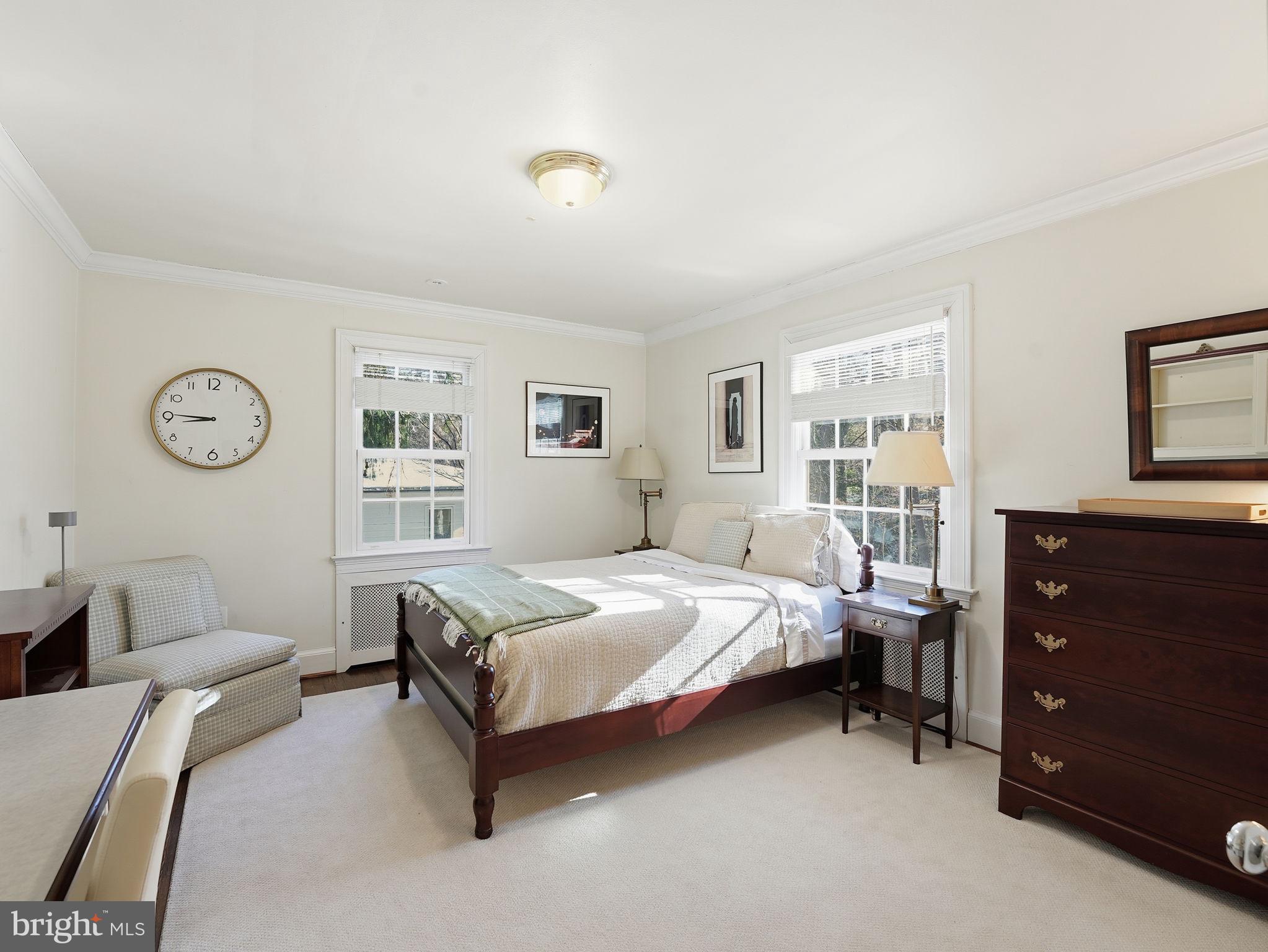 4944 Quebec Street Northwest Washington, DC 20016 - Photo 25 of 41 2nd Bedroom with hardwood and natural light.
