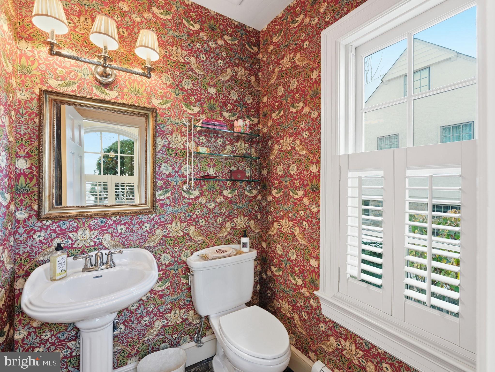 4944 Quebec Street Northwest Washington, DC 20016 - Photo 7 of 41 Powder room conveniently located off the foyer.