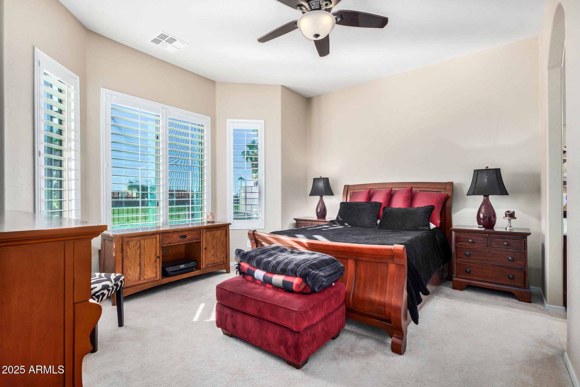 6202 East McKellips Road, Unit 139 Mesa, AZ 85215 - Photo 15 of 54 a bedroom with a bed and window