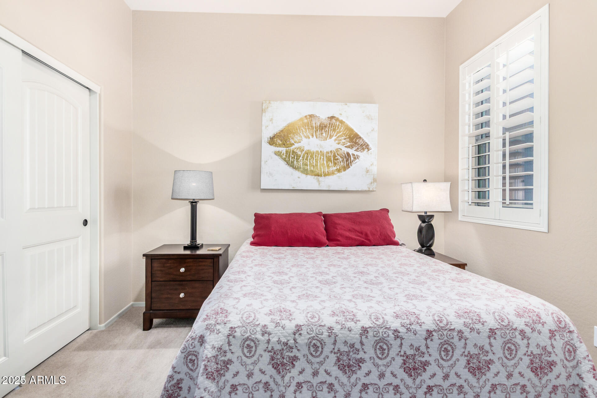 6202 East McKellips Road, Unit 139 Mesa, AZ 85215 - Photo 21 of 54 a bedroom with a bed and a lamp on table