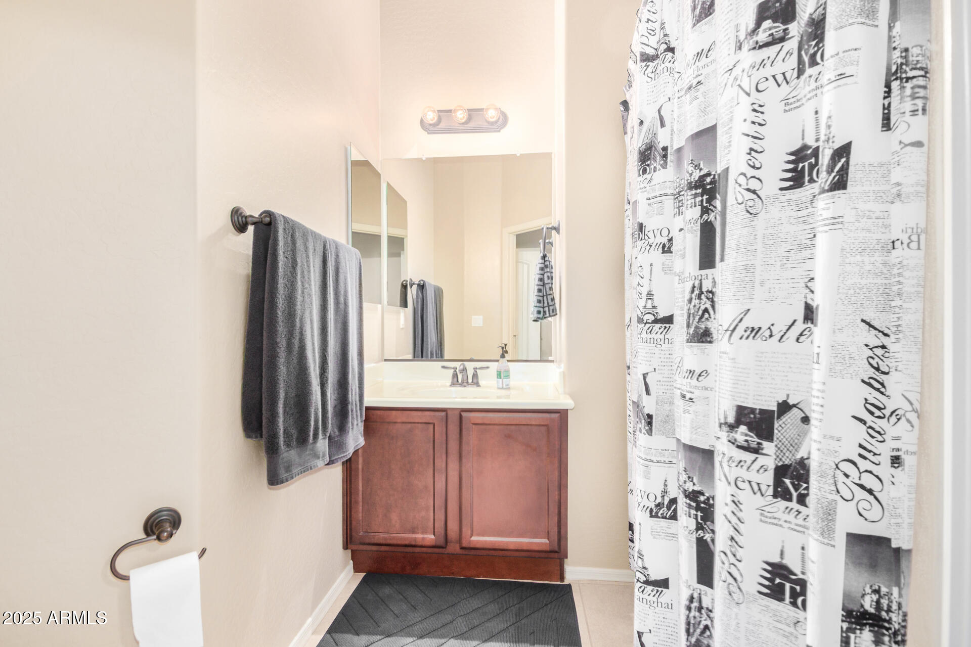 6202 East McKellips Road, Unit 139 Mesa, AZ 85215 - Photo 23 of 54 a bathroom with a shower and a sink
