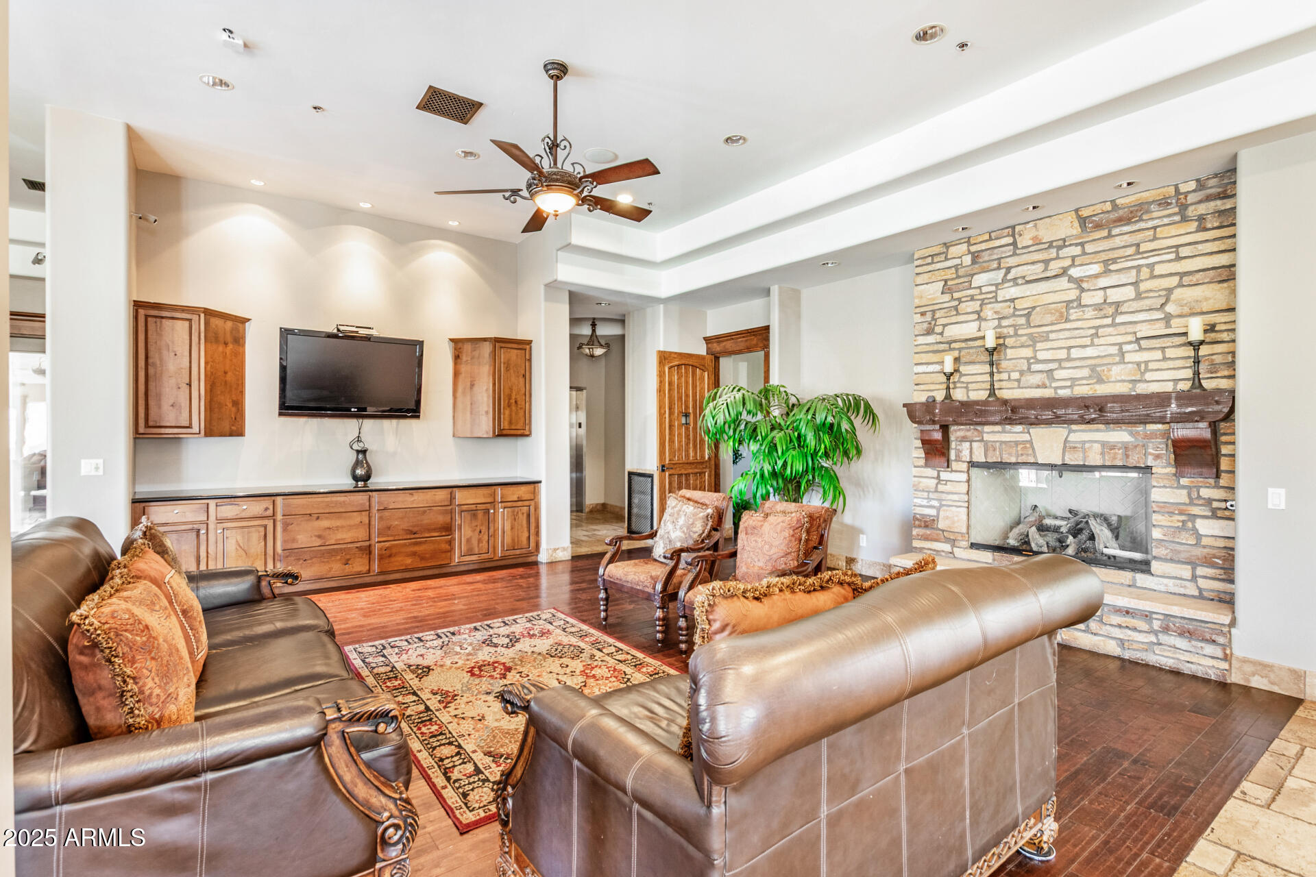 6202 East McKellips Road, Unit 139 Mesa, AZ 85215 - Photo 42 of 54 a living room with furniture and a flat screen tv